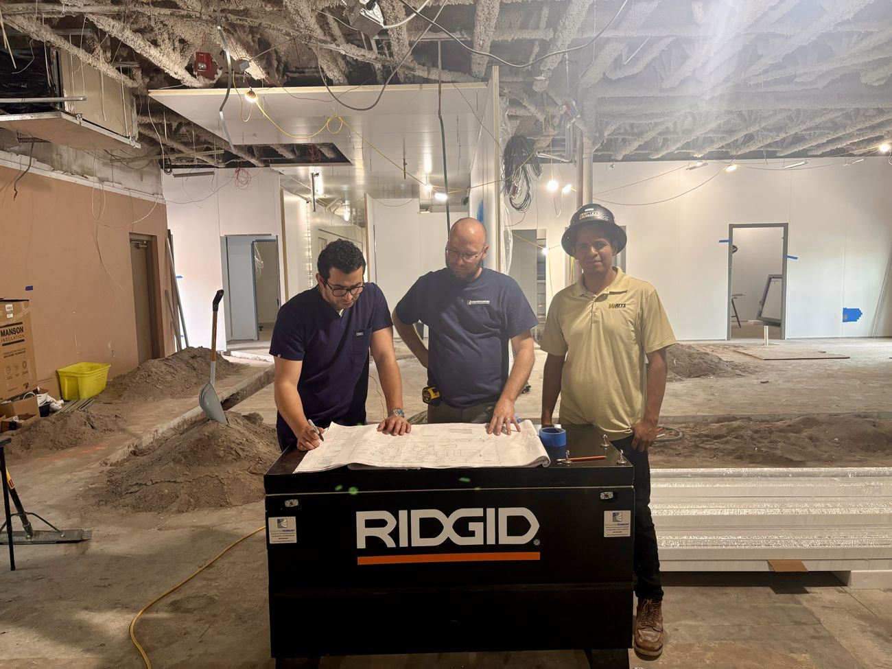 Marking up cleanroom drawings with the builder and general contractor