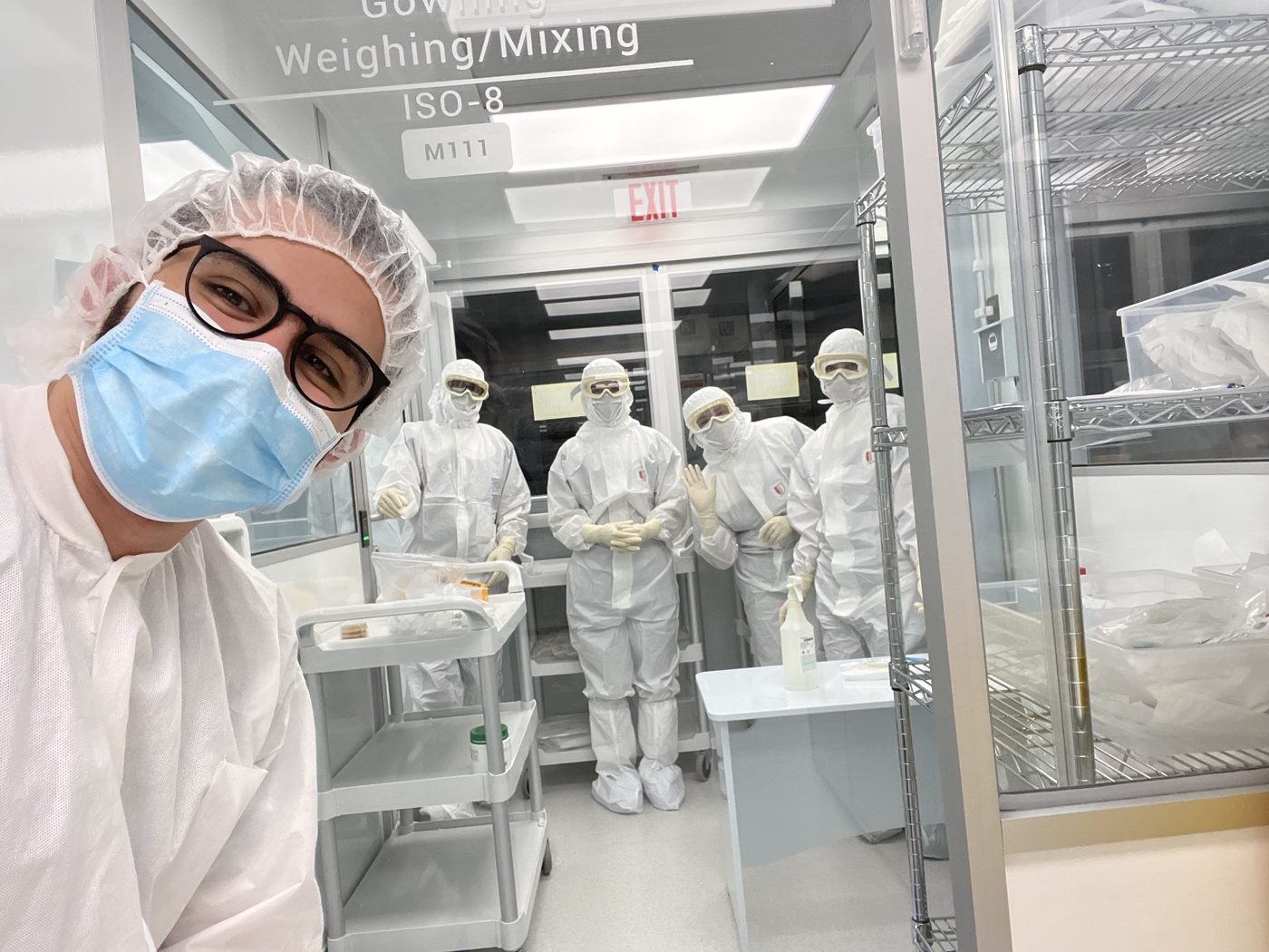 With the compounding team in an ISO 8 weighing and mixing room
